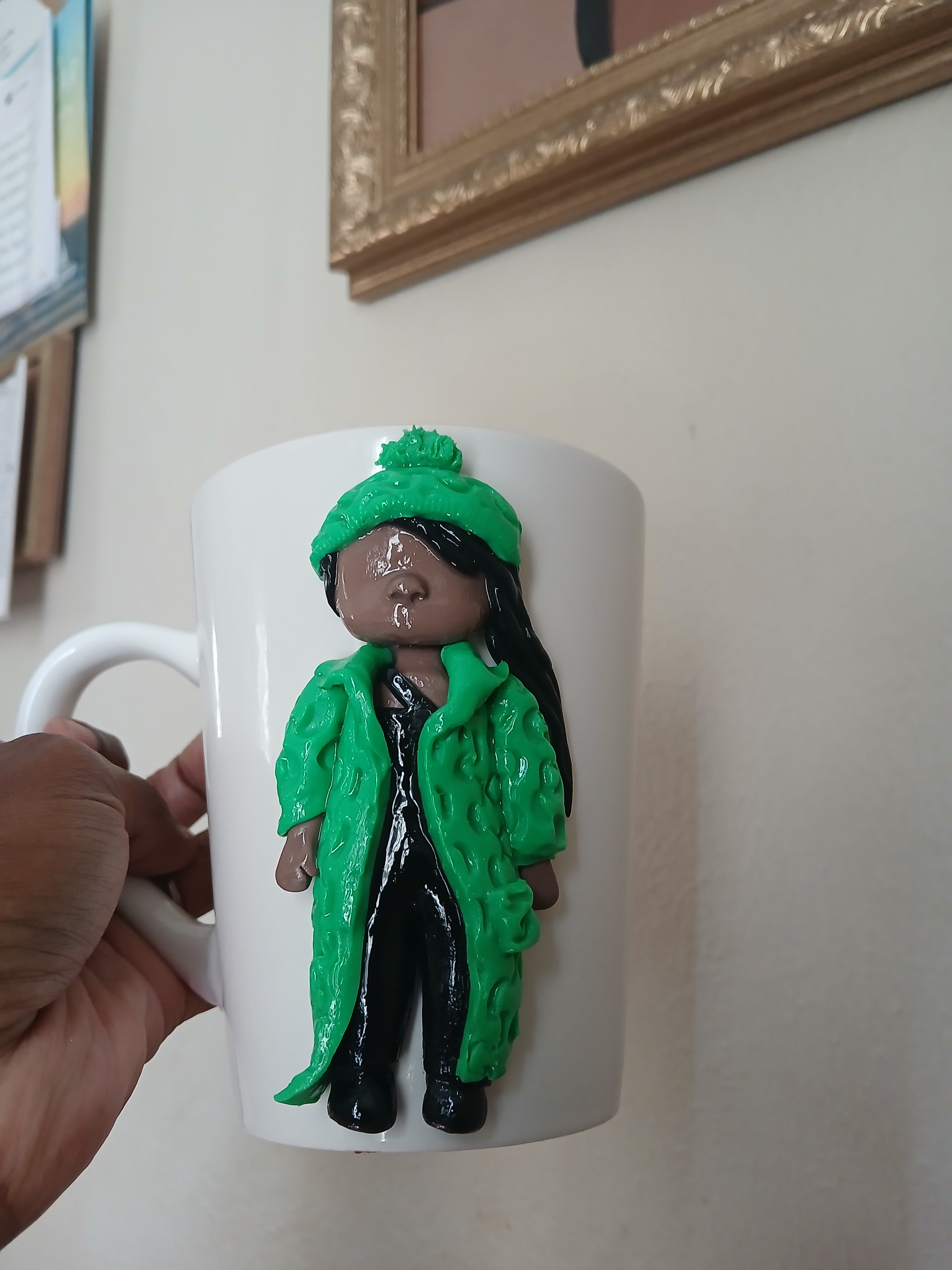Clay doll sculpture mug
