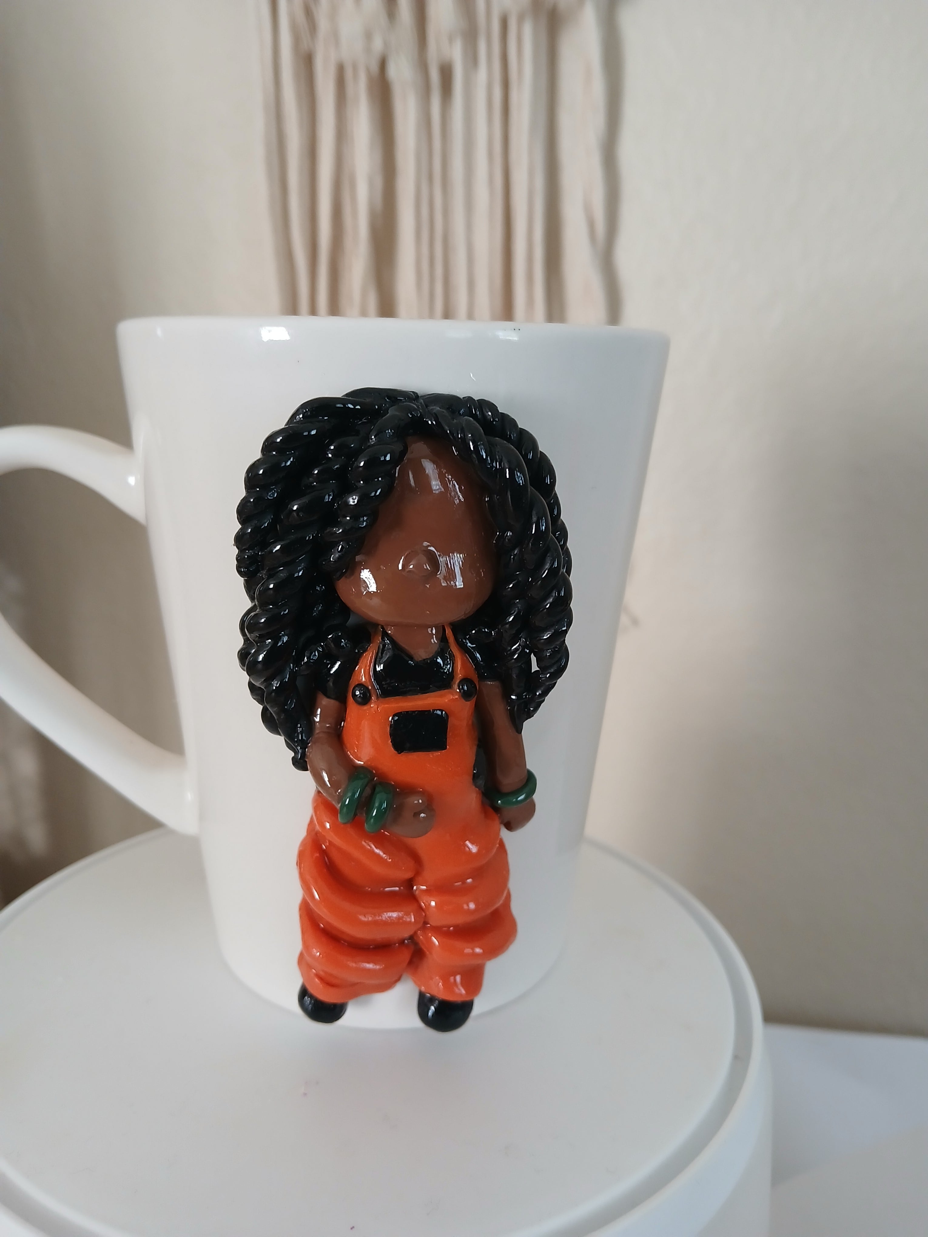 Clay doll sculpture mug