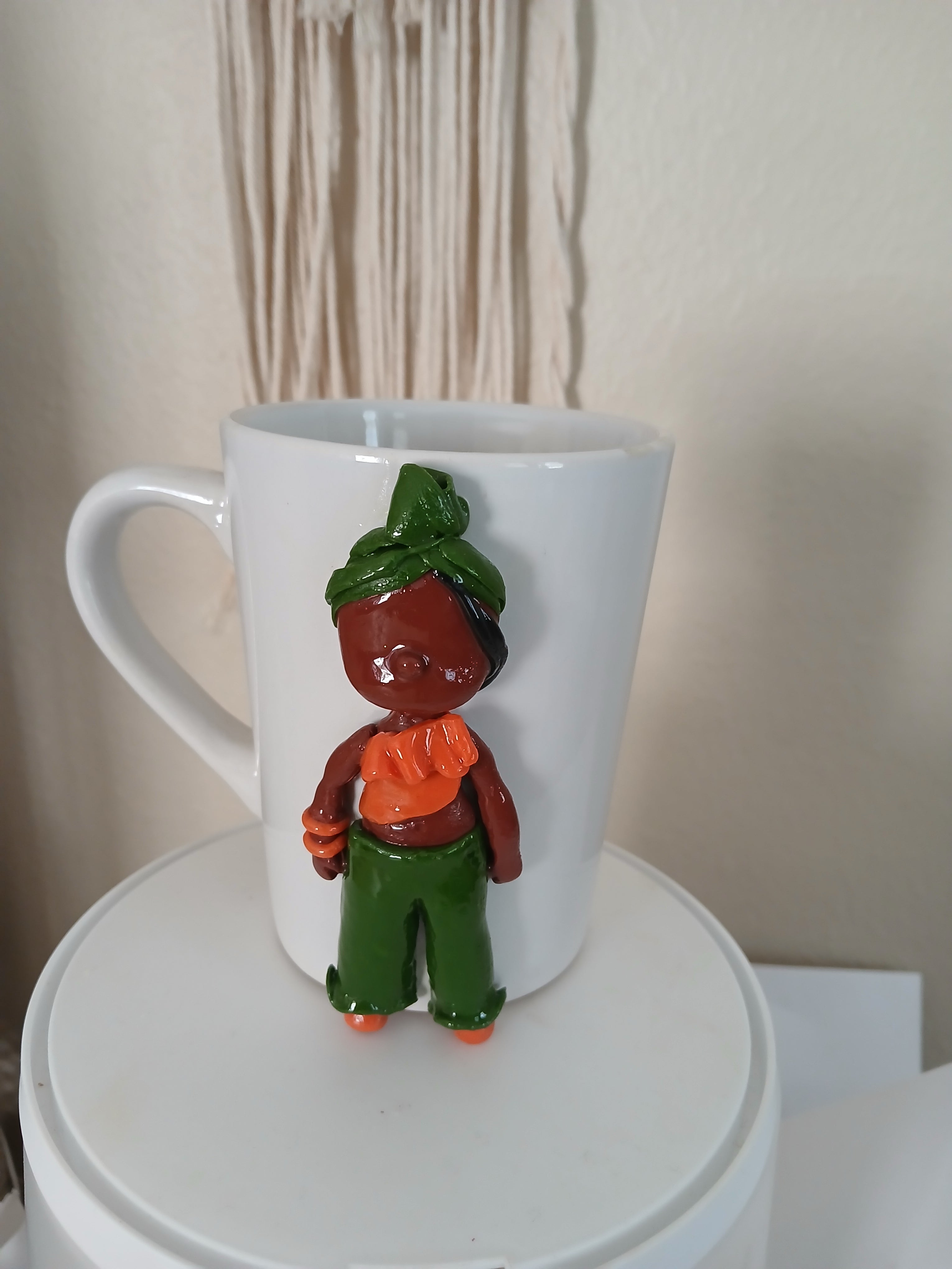 Clay doll sculpture mug